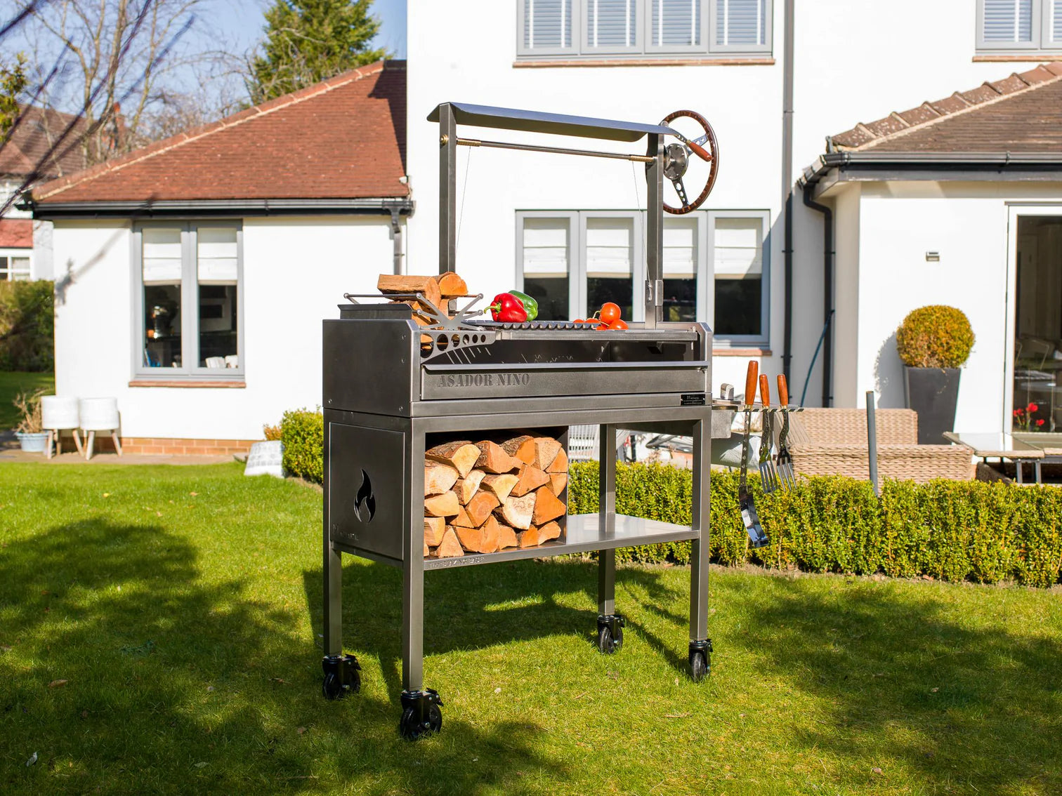 Metartal Asador Nino Stainless Steel Stand on Castors with Log Storage Area